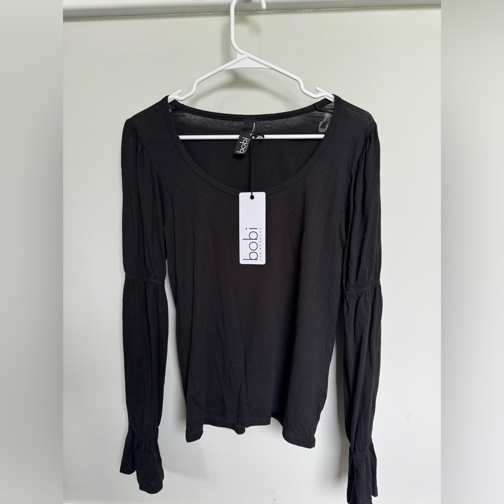 Bobbi LA. Size small. Long sleeve black ruffle sleeve. NWT